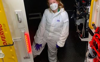 Amy Hughes PPE back of ambulance