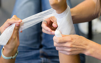 First aid for a bleeding wound