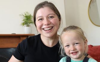 Beth with her nephew smiling
