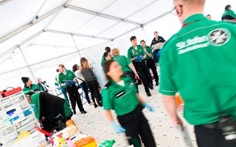 Busy First Aid treatment tent