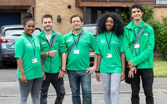 Group of Wesser fundraisers standing together wearing St John Ambulance branded t shirts.