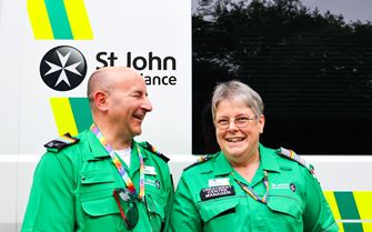 Volunteers-smiling-ambulance