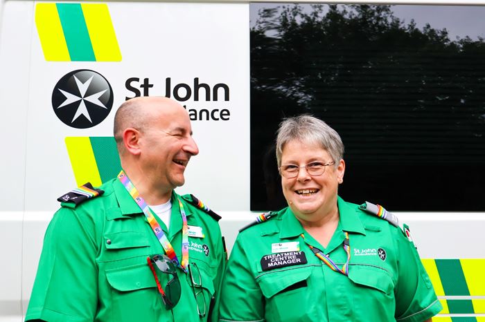 Volunteers-smiling-ambulance
