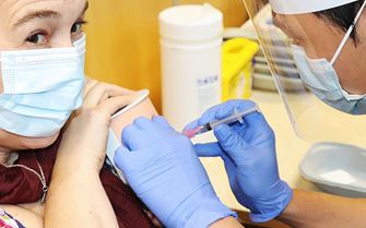 Volunteer_vaccinator_numbered pod