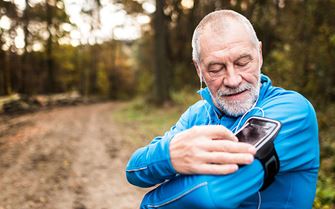 Man checking his pedometer