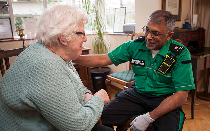 Community first responder reassures elderly lady