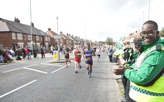 Volunteers supporting runners in the Great North Run